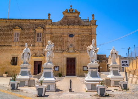 Saint Augustine convent with statues at the entrance in Victoria, in the island of Gozo, Malta の写真素材