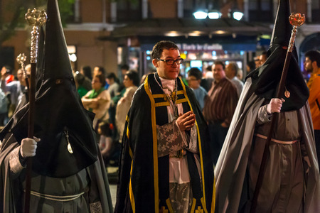 VALLADOLID, SPAIN  APRIL 17, 2014  People in the religious processions during Holy Week on Good Thursday Night, on April 17, 2014 in Valladolid, Spain のeditorial素材