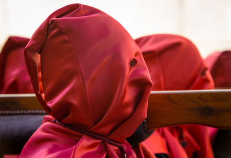 Red nazareno head in the Good Thursday during Holy Week in Valladolid の写真素材
