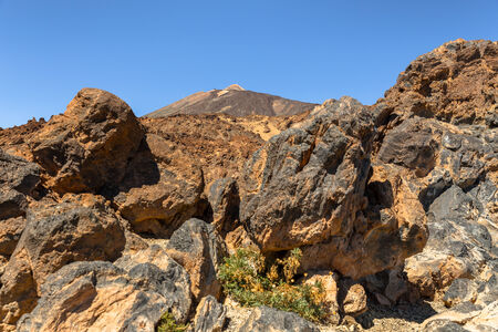 Teide volcano behind volcanic rocks in Tenerife の写真素材