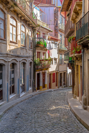 Descent old alley in downtown Porto.の写真素材