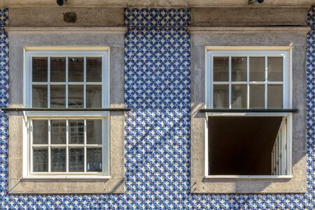 Blue tile decoration in a Porto building.の写真素材