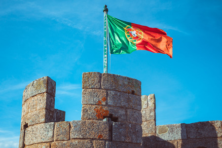 Castle turret with a flag of Portugal.のeditorial素材