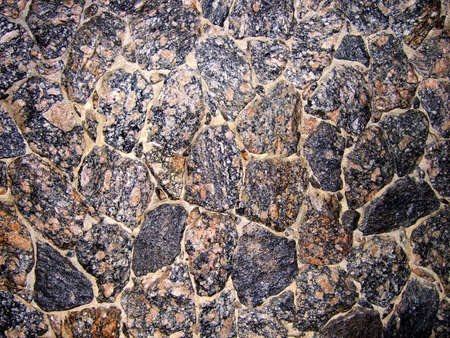 Wall made of rocks in closeの写真素材