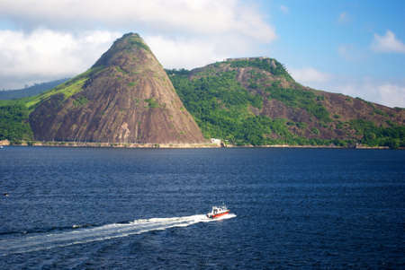 Sailing boat over a blue sea の写真素材