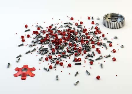 Pile of nuts and bolts from disassembled clutch isolated on whiteの写真素材