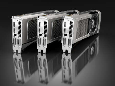 Three Computer graphic cards on black reflective background