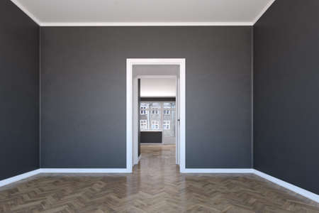 Scandinavian interior with wooden floor and dark wallsの写真素材
