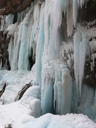 Beautiful winter landscape of frozen waterfalls in the Gorge of Chegem, the Republic of Kabardino-Balkaria, Russia.の写真素材
