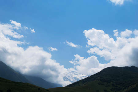 View of the mountains of the North Caucasus. Mountains in the clouds in summerの写真素材