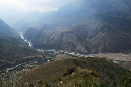 View of the mountains of the North Caucasus. Mountains in the clouds in summer