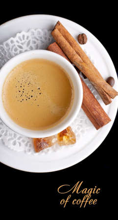 Coffee background and white cup isolated in black の写真素材