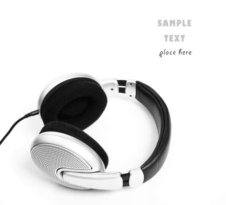 Silver headphones isolated on white backgroundの写真素材