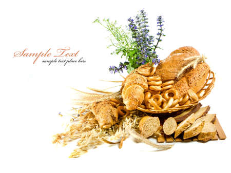 Wheat and bread over white background の写真素材