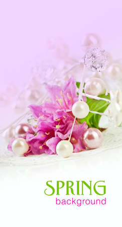 Pink flowers with fresh green leaves,isolated on white の写真素材