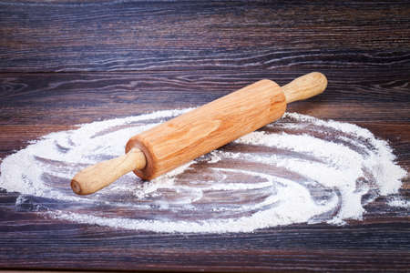 white flour on wooden table