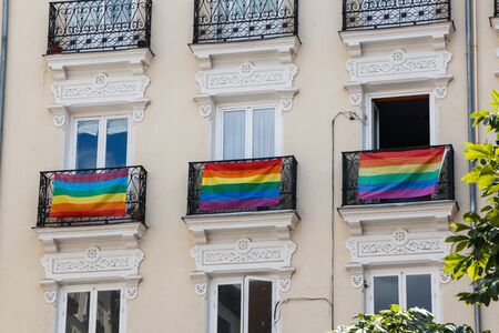 June, 30 2017 Madrid, Spain. Multicolored gay pride banners decorating houses and balconies in the streets of madridのeditorial素材