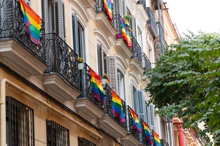 June, 30 2017 Madrid, Spain. Multicolored gay pride banners decorating houses and balconies in the streets of madridのeditorial素材