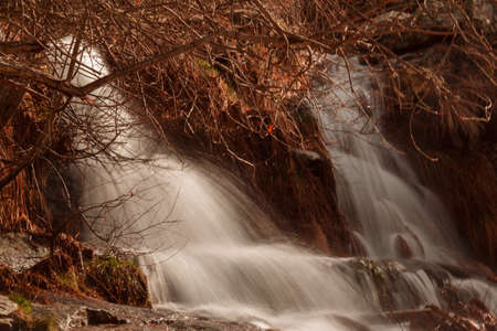 Waterfall photographed at low speed with silky effectの写真素材