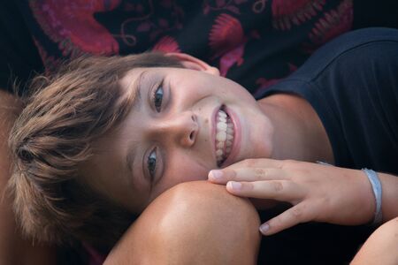 Close-up of young boy in a garden