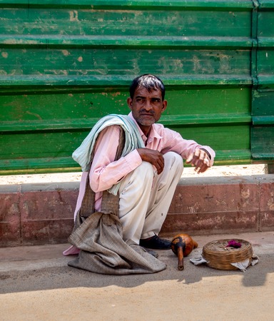 Jaipur, India, 18th to 22nd September 2018 Man on the street asking tourists for financial help
