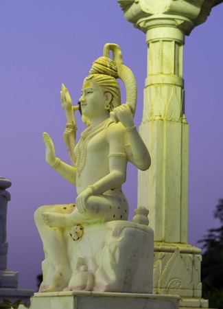 Image of the god shiva on an altar at duskの写真素材