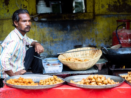 Jaipur, India, 18th to 22nd September 2018 Man at his food establishment waiting for a customer to buy him something.のeditorial素材