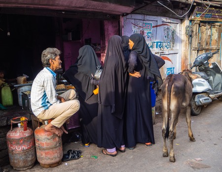 Jaipur, India, 18th to 22nd September 2018 Group of women waiting to be attended in a street establishmentのeditorial素材