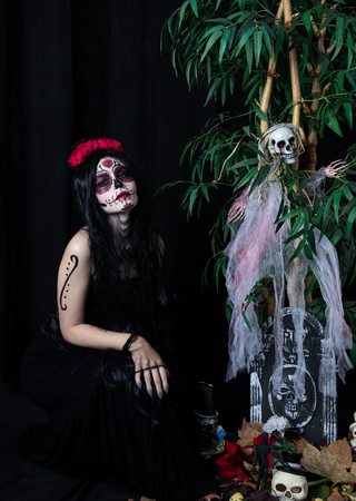 Make-up model with theme Mexican Day of the Dead in a study session in madrid, spainの写真素材