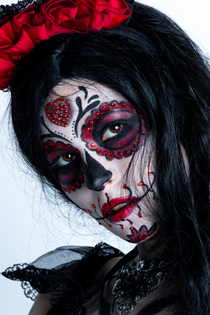 Make-up model with theme Mexican Day of the Dead in a study session in madrid, spainの写真素材