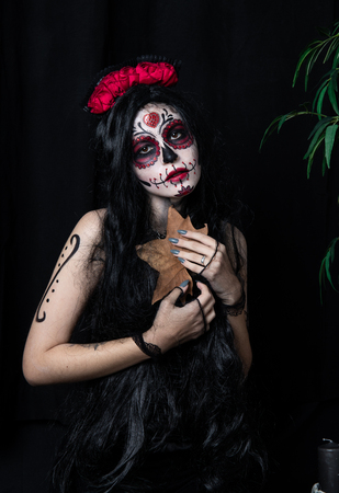 Make-up model with theme Mexican Day of the Dead in a study session in madrid, spainの写真素材
