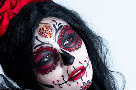 Make-up model with theme Mexican Day of the Dead in a study session in madrid, spainの写真素材
