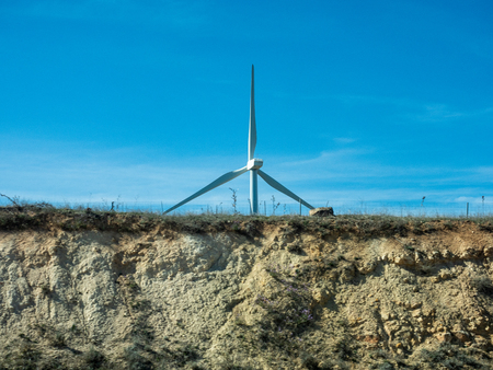 Pictures of wind energy mills from a car on the motorwayの写真素材
