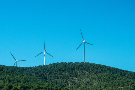 Pictures of wind energy mills from a car on the motorwayの写真素材