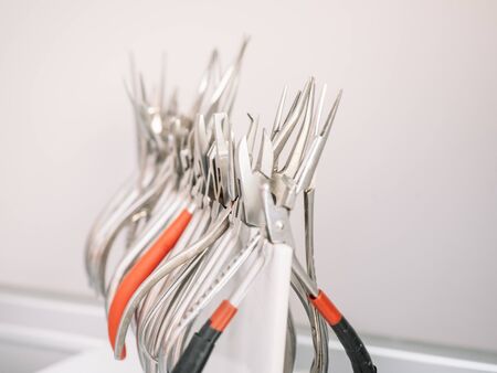 Close-up of a dentist's instrument in the clinic where he attends patients.の写真素材