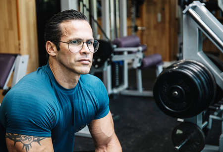 Stock photo of a detail of a man's face in the gym. Fitness and bodybuildingの写真素材