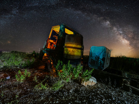 Rear view night photo of truck with milky wayの写真素材