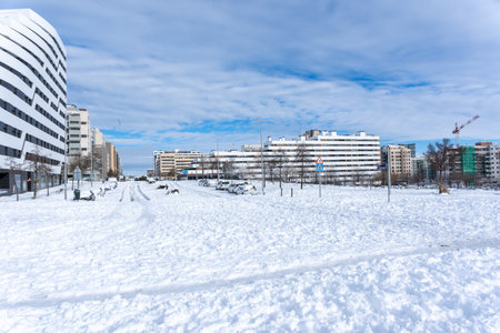 Urban area covered in snow after a snowfall. Winter season and urban lifestyle concept.の写真素材