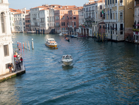 October 30, 2022 - Venice, Italy: Boats navigating the canals of Venice. Tourism concept.の写真素材
