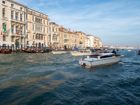 October 31, 2022 - Venice, Italy: Boats navigating in the grand canal of Venice. Tourism concept.の写真素材
