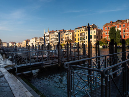 Pier on the grand canal in Venice, Italy. Tourism and transport concept.の写真素材