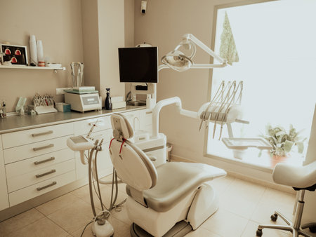 A dentist's clinic. Working armchair with utensils and tools.の写真素材