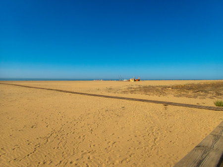 View of the large empty beach of Isla Canela, in Ayamonte, Spain. Summer concept.の写真素材