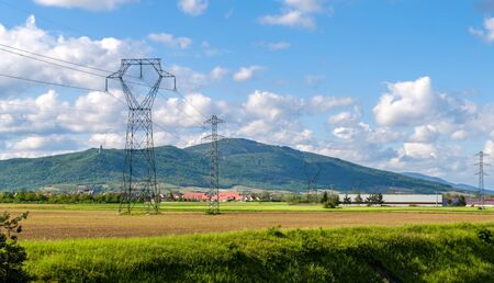 Power transmission line against a Vosges mountains background, Alsace, Franceの写真素材