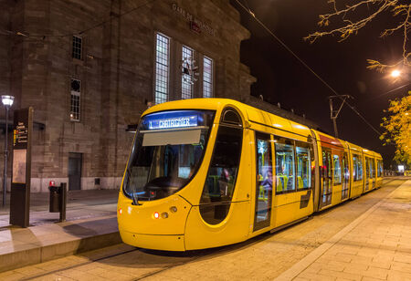 Modern tram on central station of Mulhouse - Franceのeditorial素材