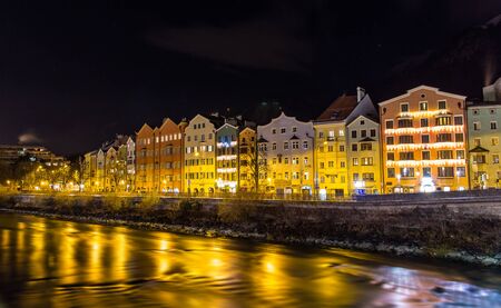 The embankment of Innsbruck at night - Austriaの写真素材