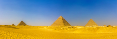 View of pyramids in Giza: Queens' Pyramids, the Pyramid of Menkaure, the Pyramid of Khafre and the Great Pyramid of Giza (Khufu or Cheops)の写真素材