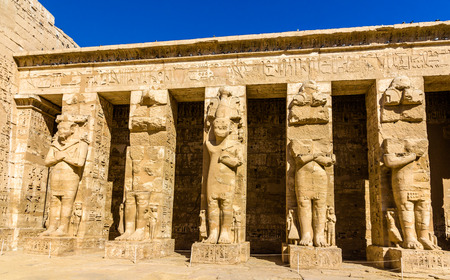 Ancient figures in the Medinet Habu temple - Egyptの写真素材