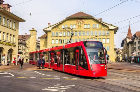 BERN, SWITZERLAND - FEBRUARY 15: Siemens Combino tram on Casinoplatz in Bern on February 15, 2015. There are 36 trams of this class in Bernのeditorial素材