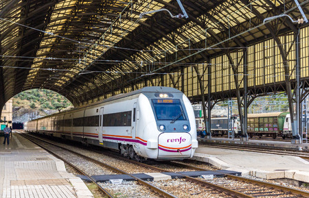 PORTBOU, SPAIN - NOWEMBER 09: High-speed Renfe train on November 09, 2013 in Portbou station. It is...